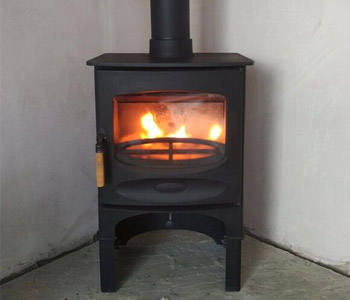 Charnwood C5 Woodburner with store stand - installed in the Surrey Hills